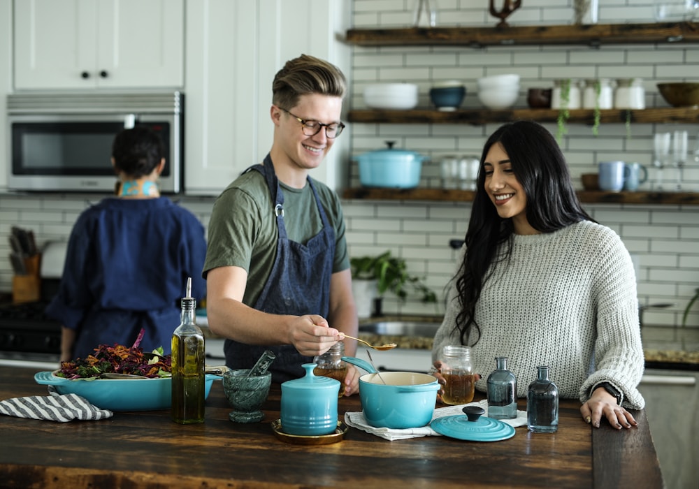 Friends cooking together in a modern kitchen